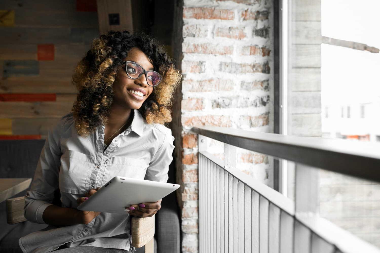 A woman reflecting on her next step at work
